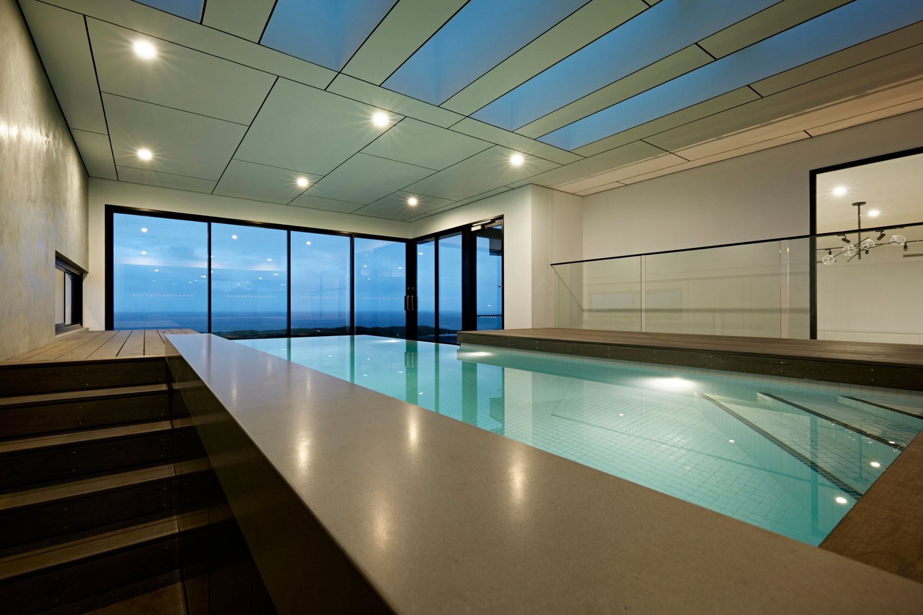 Whale Avenue custom home, indoor pool with ocean view, by Bolden Constructions
