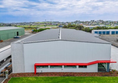 PAG warehouse office side with red feature band, White Rock Road Warrnambool, built by Bolden Constructions